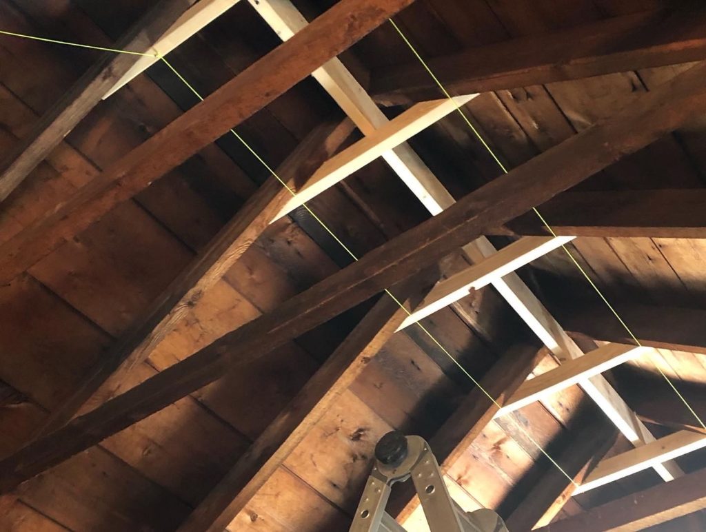 Installing rafter ties in the Barn roof