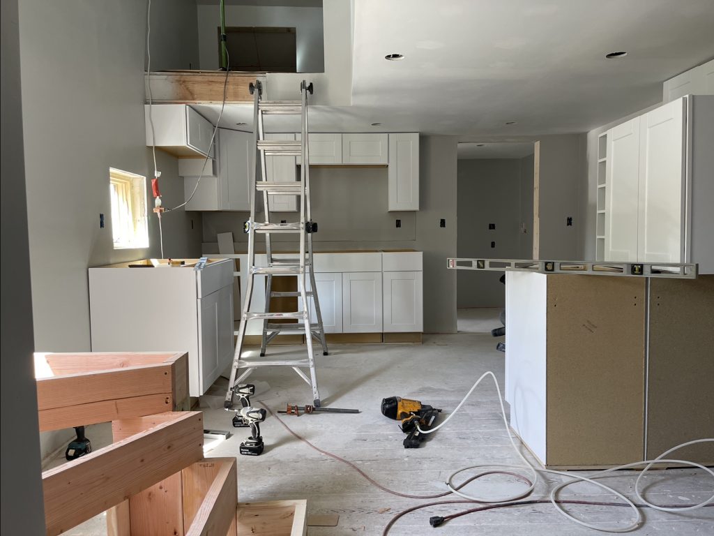 Kitchen cabinets going in