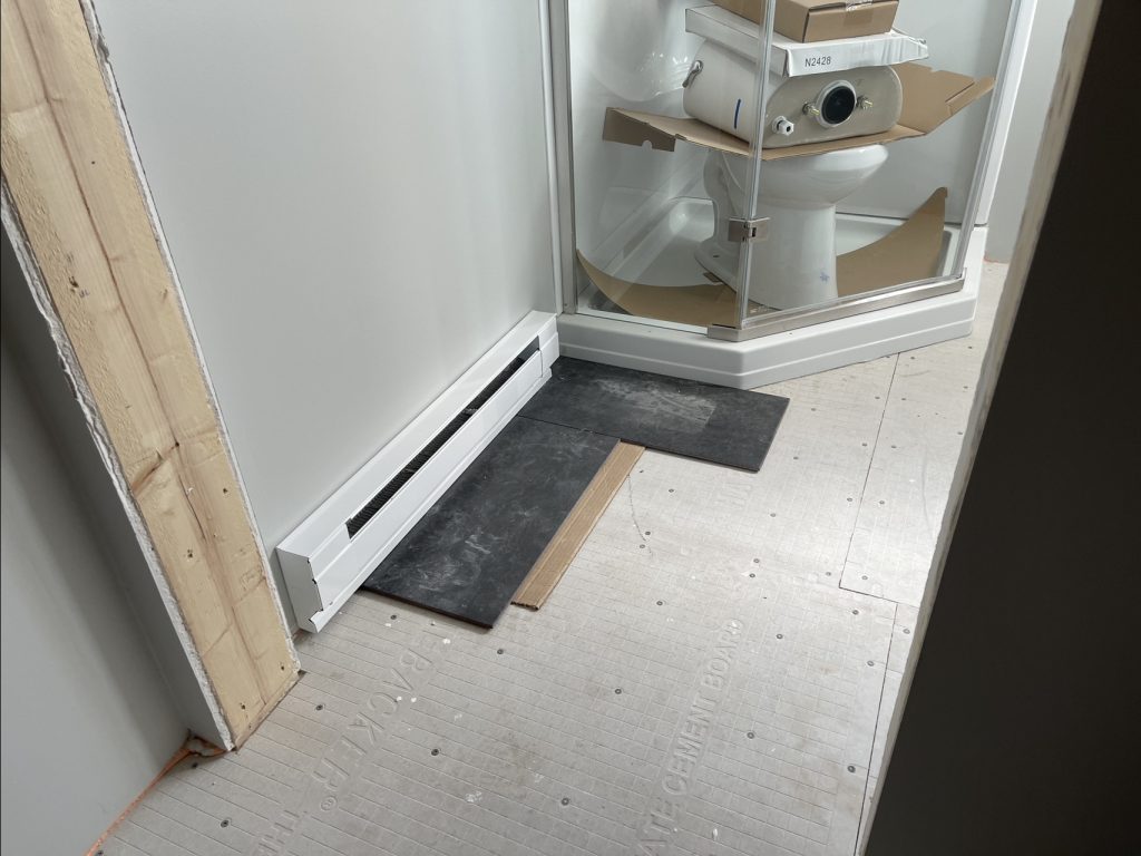 Tiles going down in the bathroom